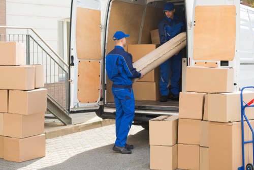 Removal team planning a move in North Finchley street setting