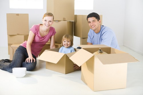 Removal team using safe handling practices during a house move