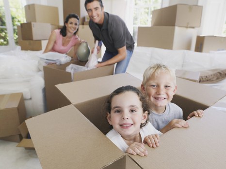 Removal van and moving boxes for a house move in North Finchley