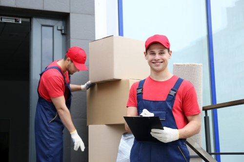Man and van loading furniture in North Finchley street setting