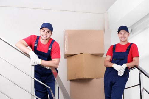 A professional removals crew working safely with equipment