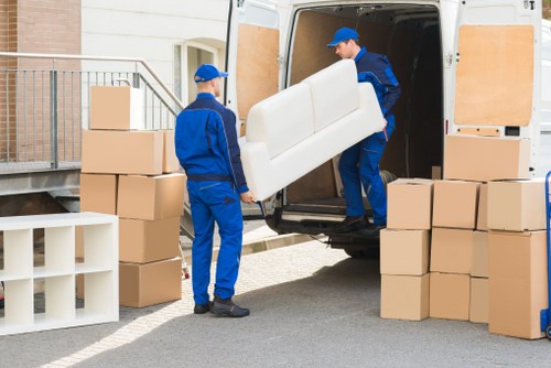 Removal boxes and furniture being prepared for a North Finchley home move