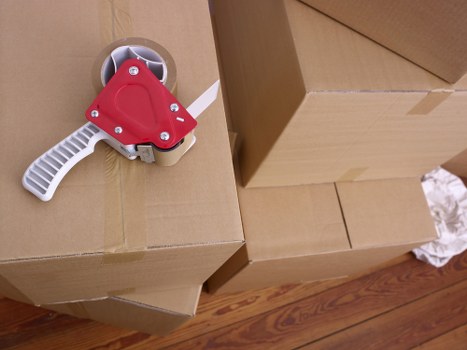 Professional movers loading household items for a Northfinchley relocation