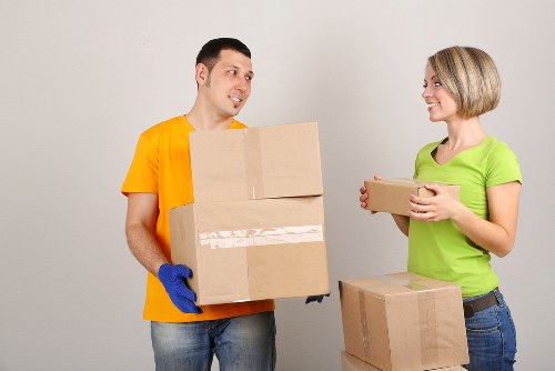 Packed boxes and furniture ready for a local move in North Finchley