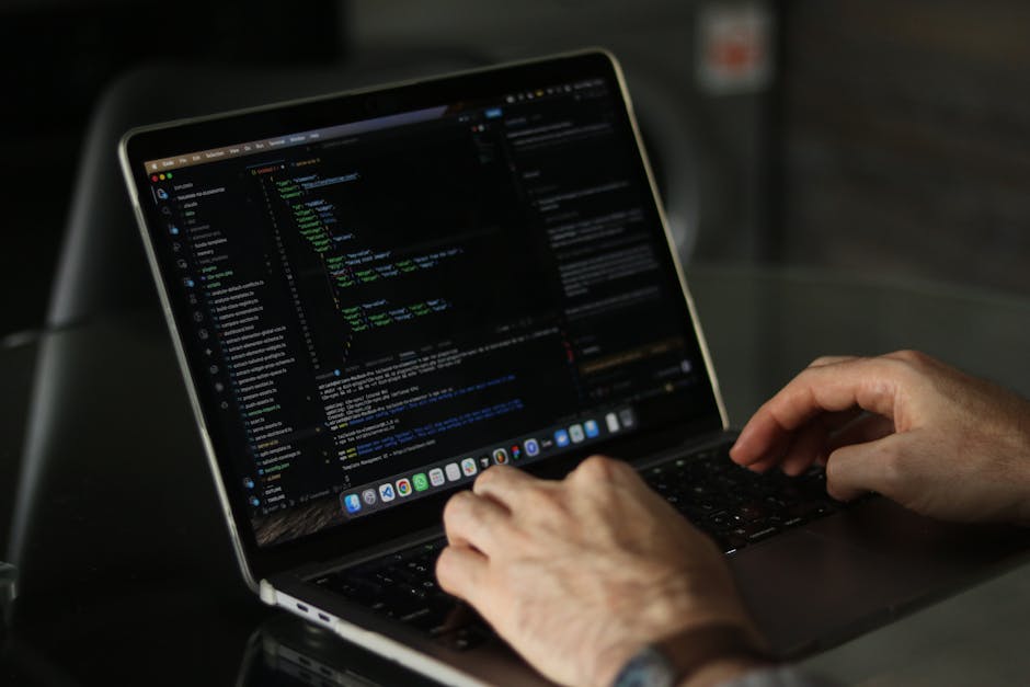 A computer screen displays a code editor with a dark background, showcasing lines of HTML and CSS code. The visible code includes tags such as <html>, <head>, <title>, and <link>, with some lines high